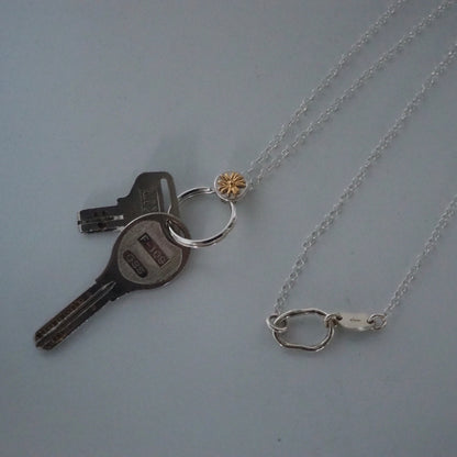 daisy sholder key chain