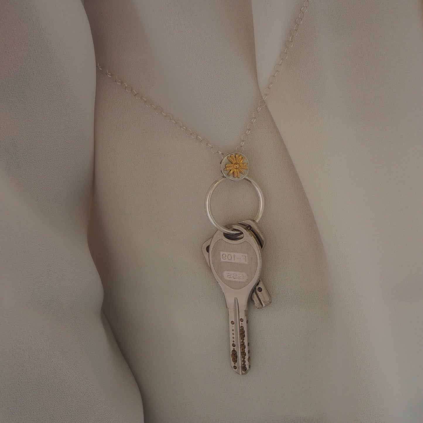 daisy sholder key chain