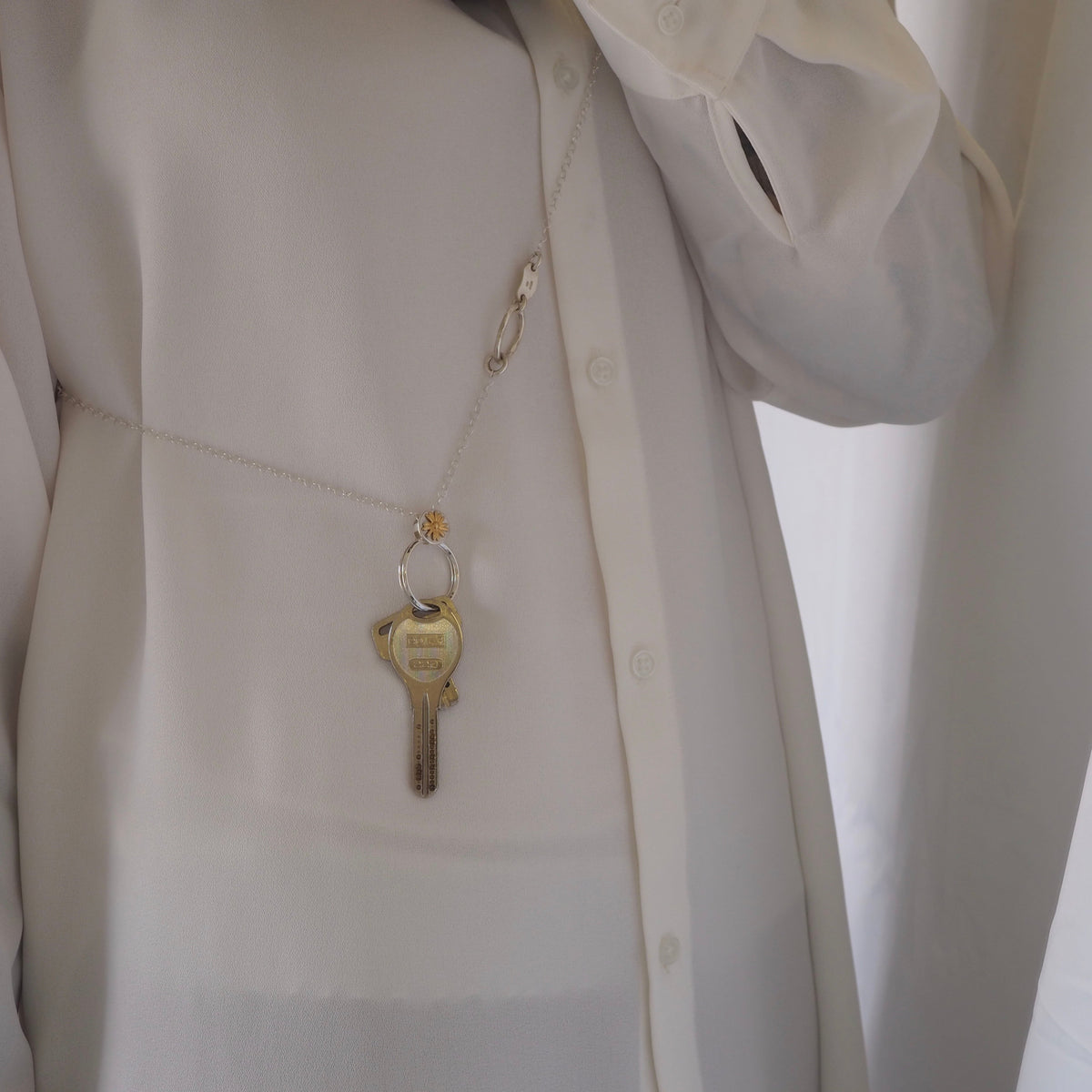 daisy sholder key chain