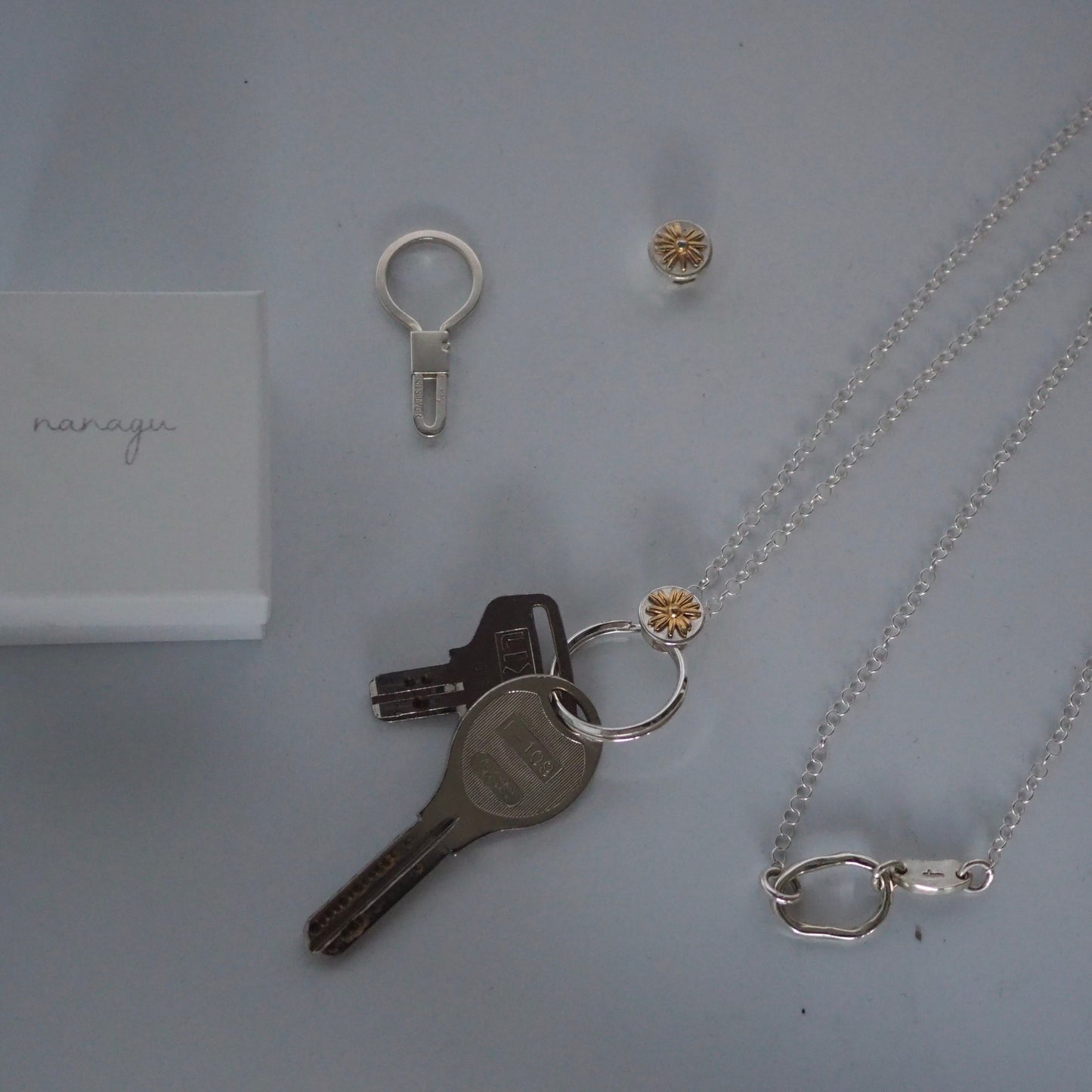 daisy sholder key chain