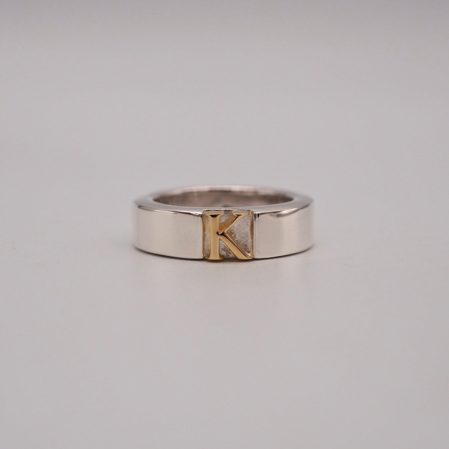 initial plain ring