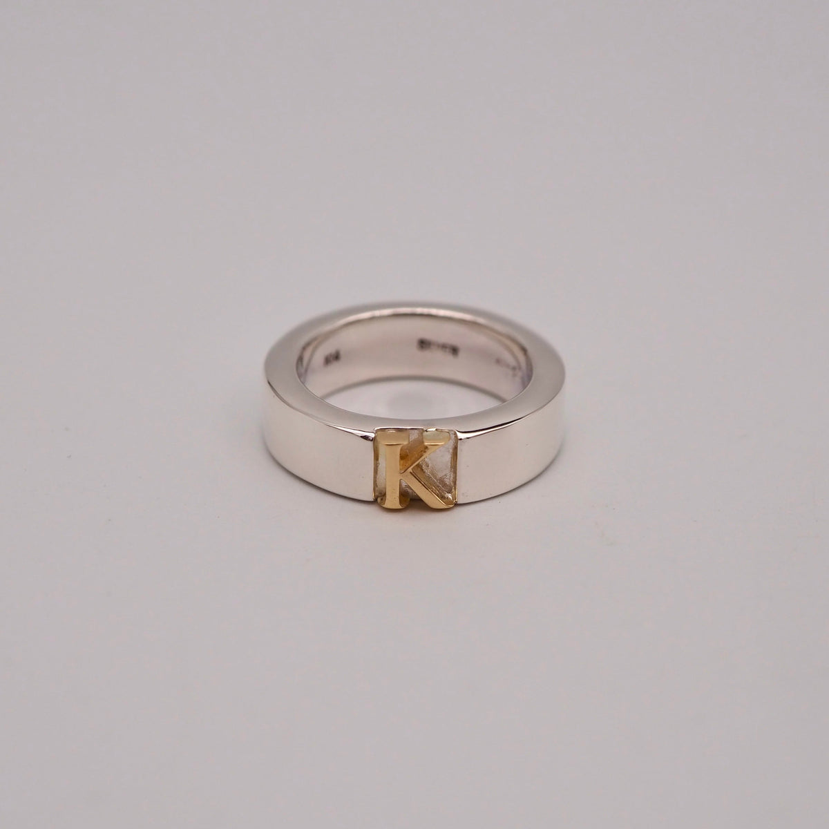 initial plain ring