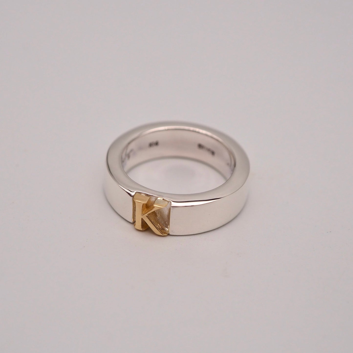initial plain ring