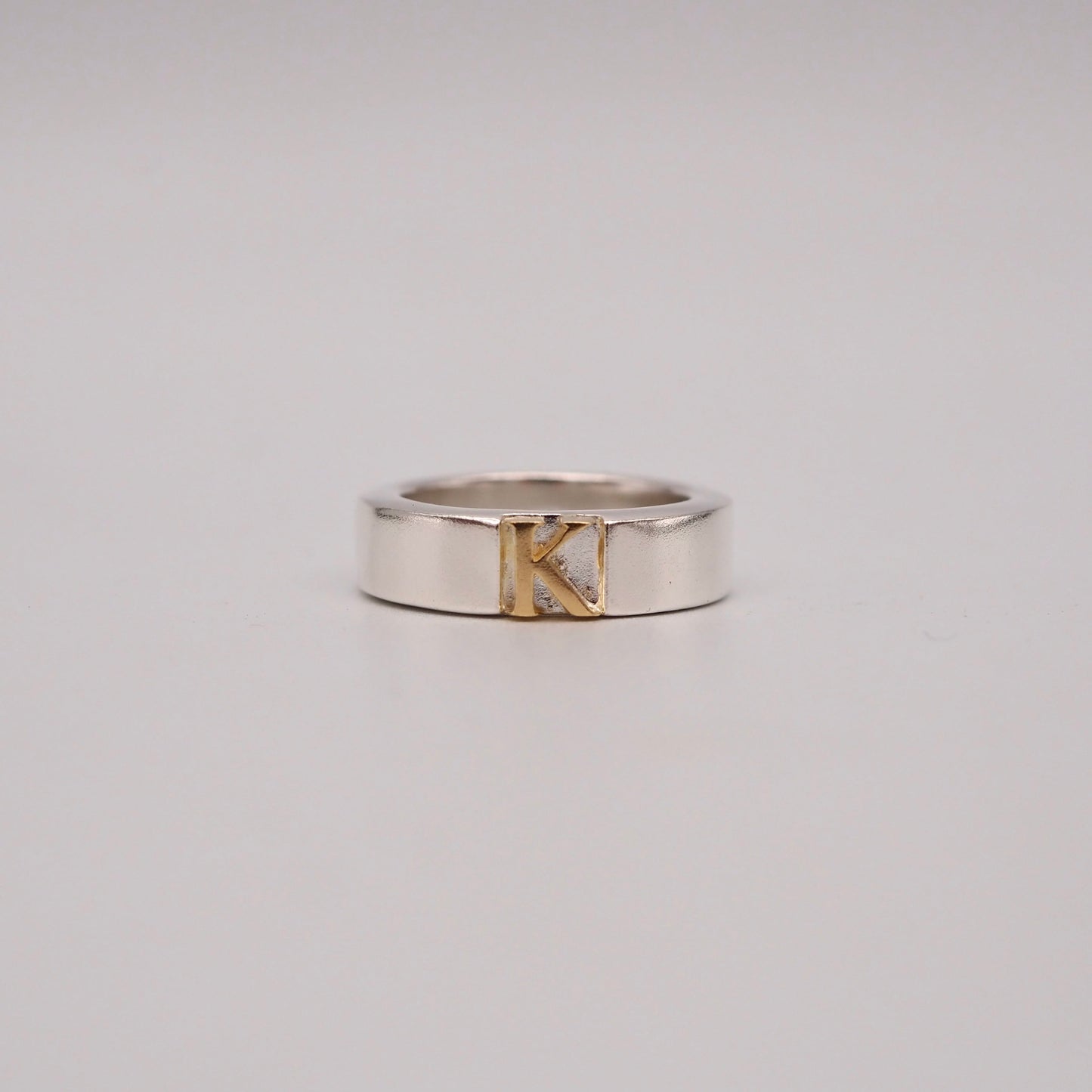initial plain ring