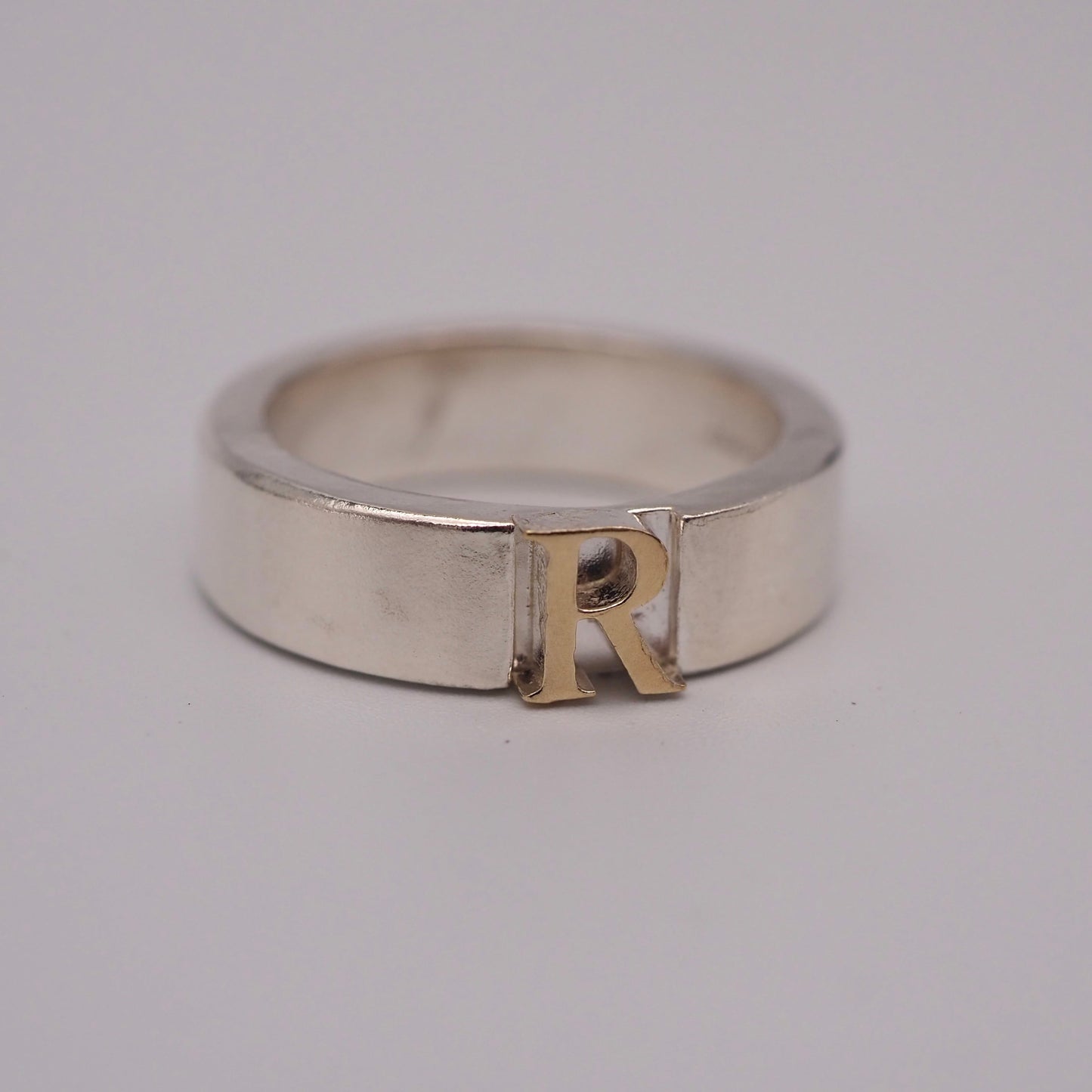 initial plain ring