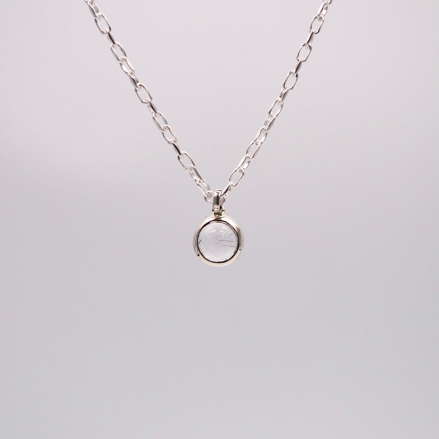 q dot L necklace