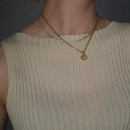 q dot L necklace