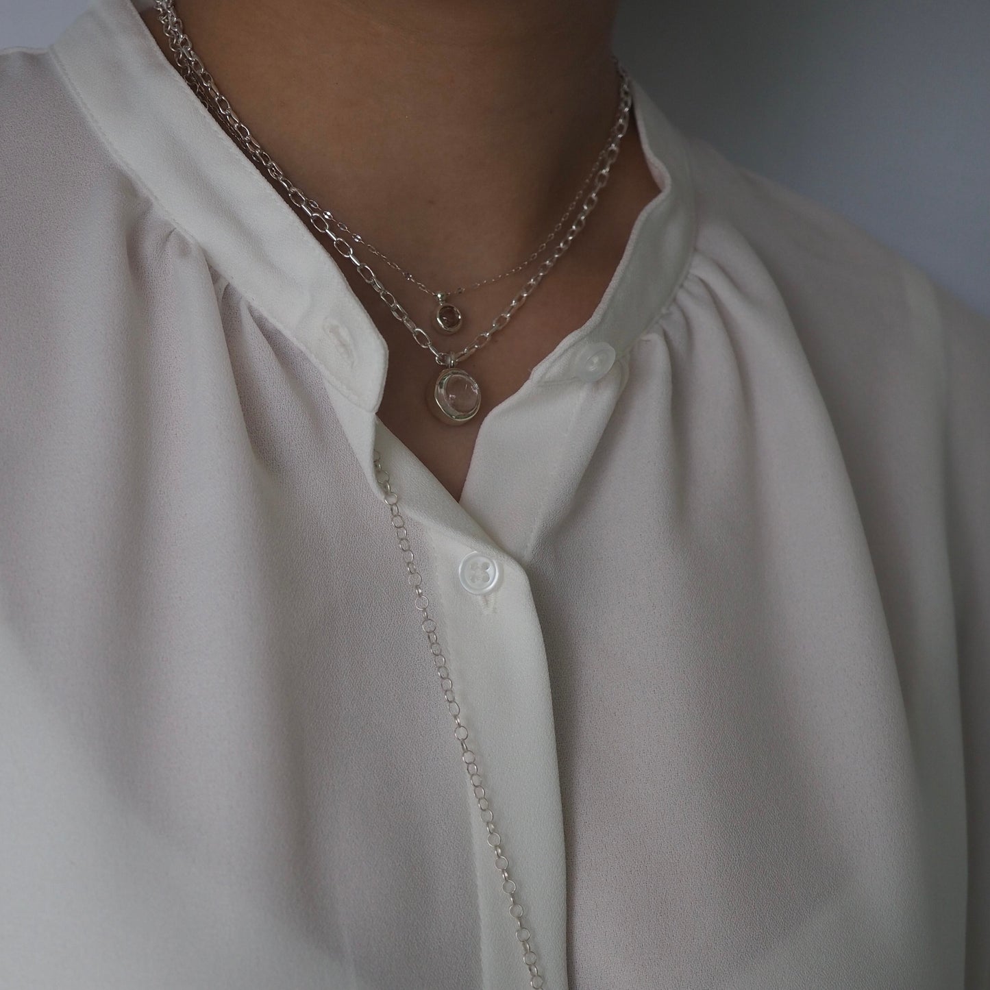 q dot S necklace