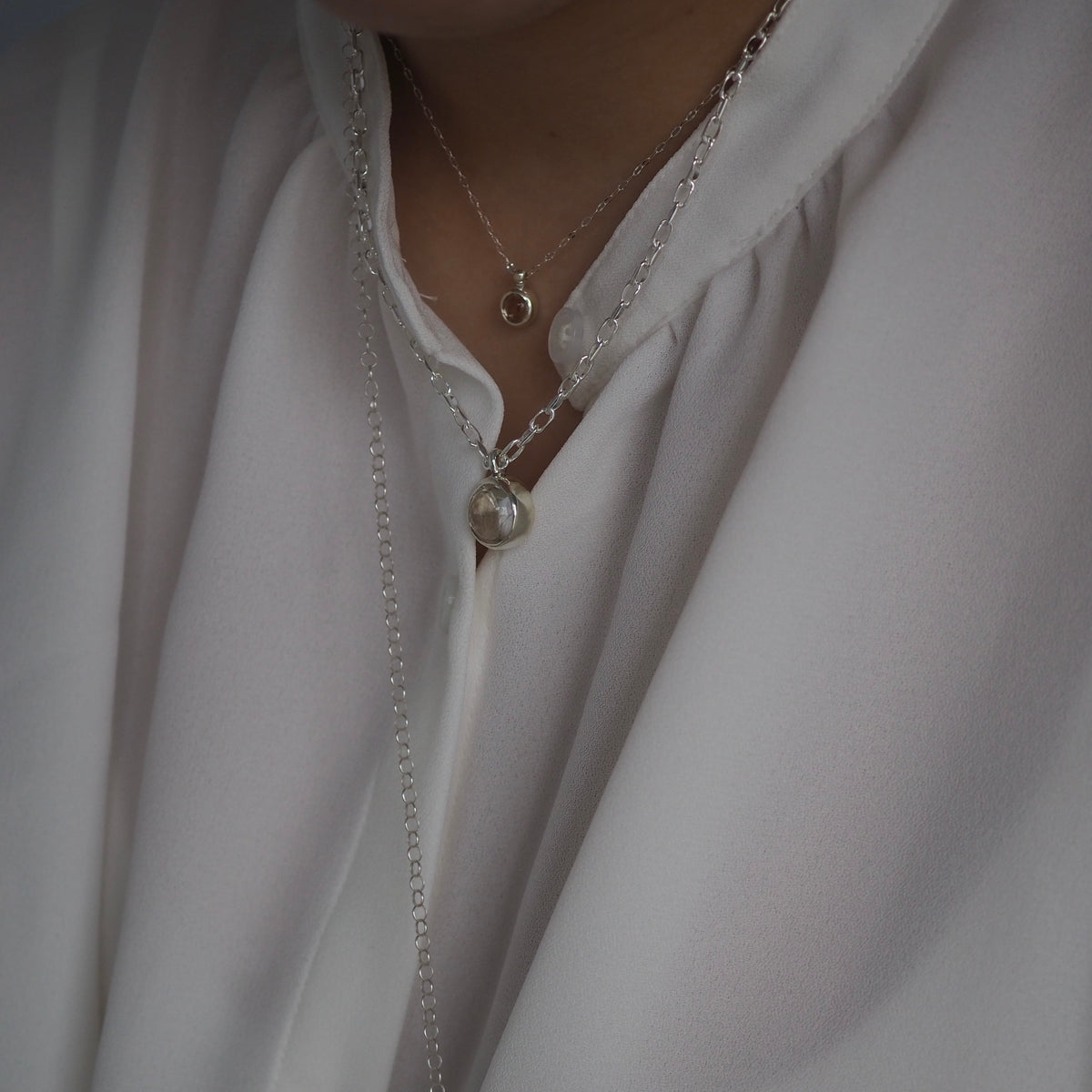 q dot S necklace