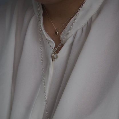 q dot S necklace
