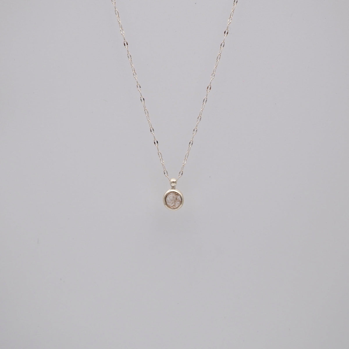 q dot S necklace