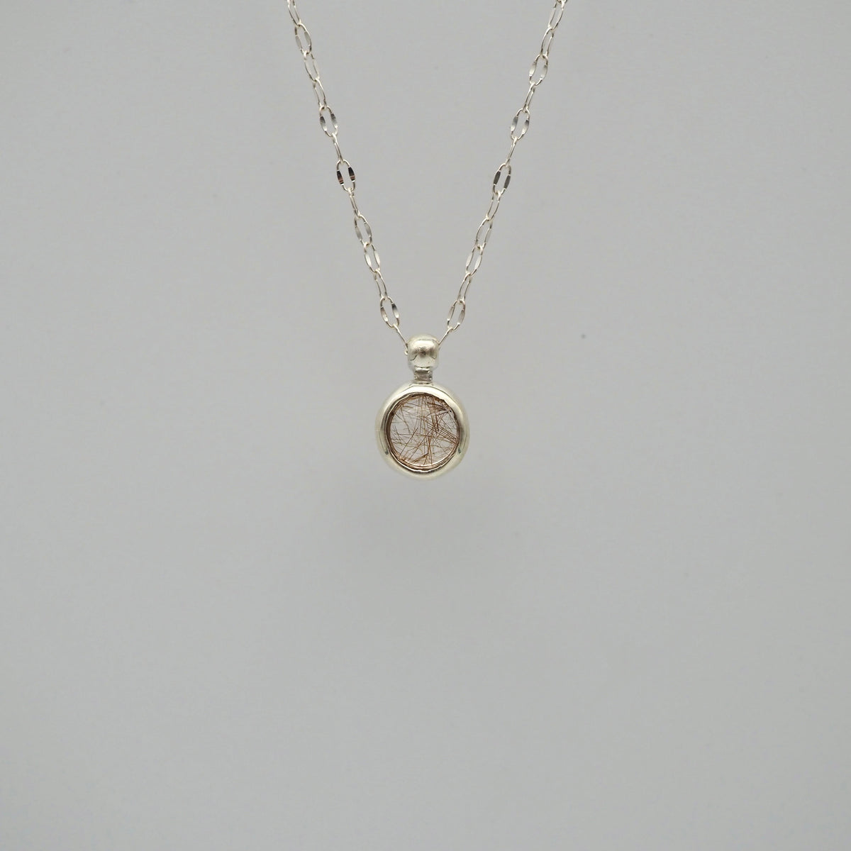 q dot S necklace