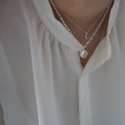 q dot S necklace