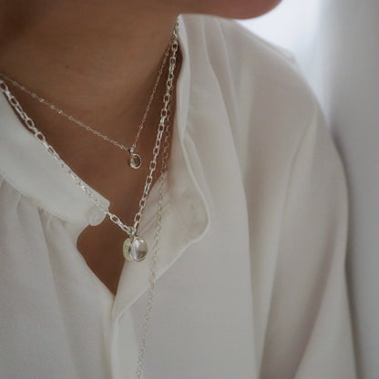 q dot S necklace