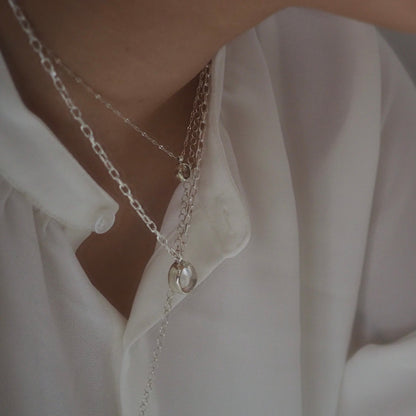 q dot S necklace