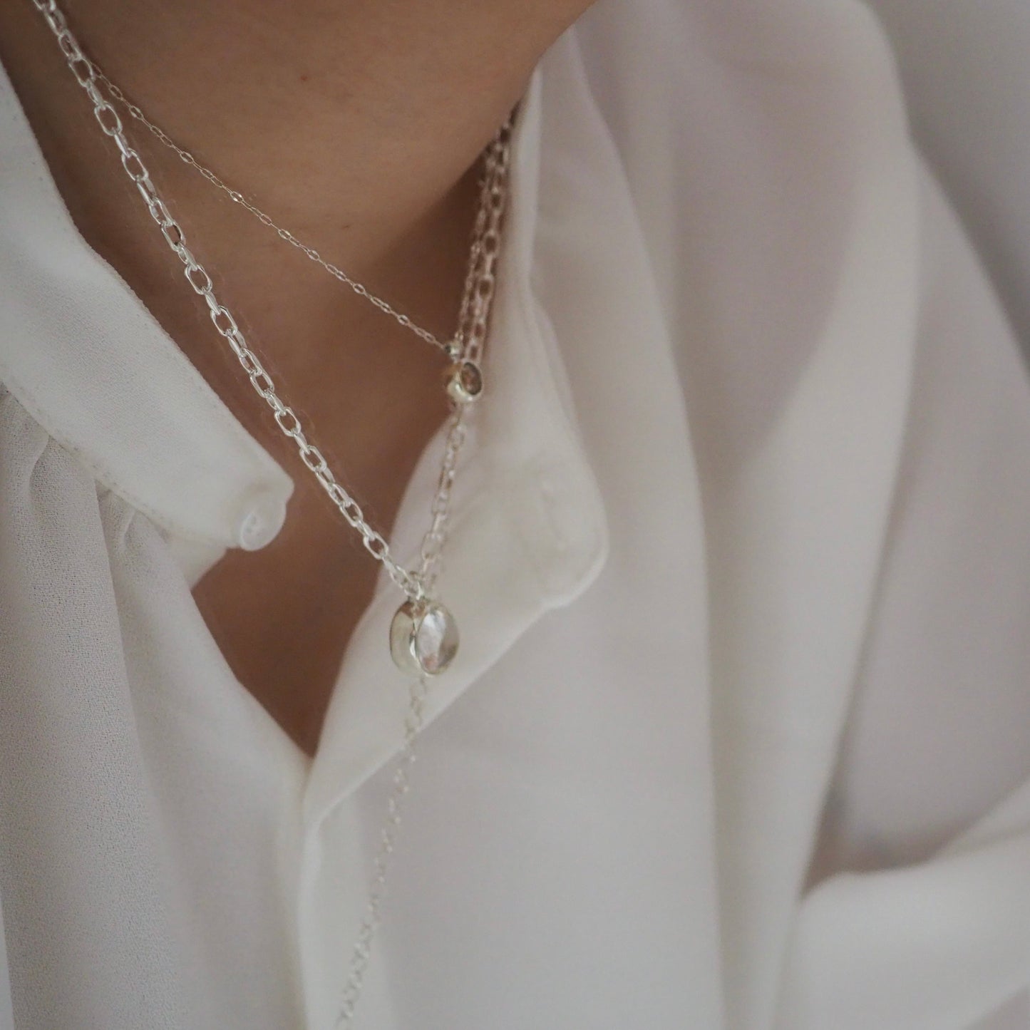 q dot S necklace